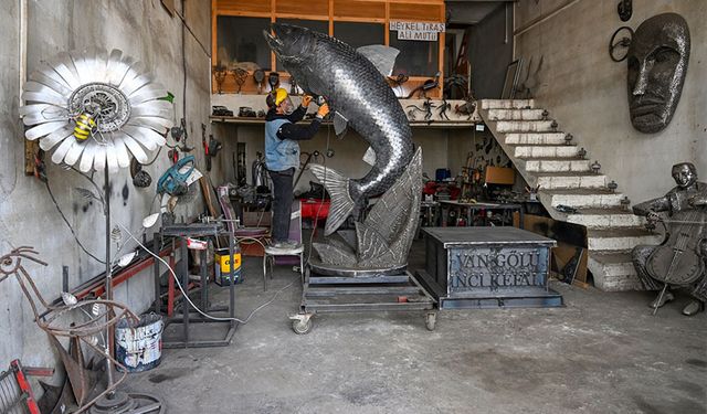 İranlı heykeltıraş 350 kilogramlık hurda demirden "inci kefali" heykeli yaptı